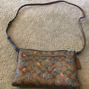 Cute Coach crossbody with matching wallet!